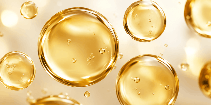 Golden oil droplets representing palmitoylethanolamide
